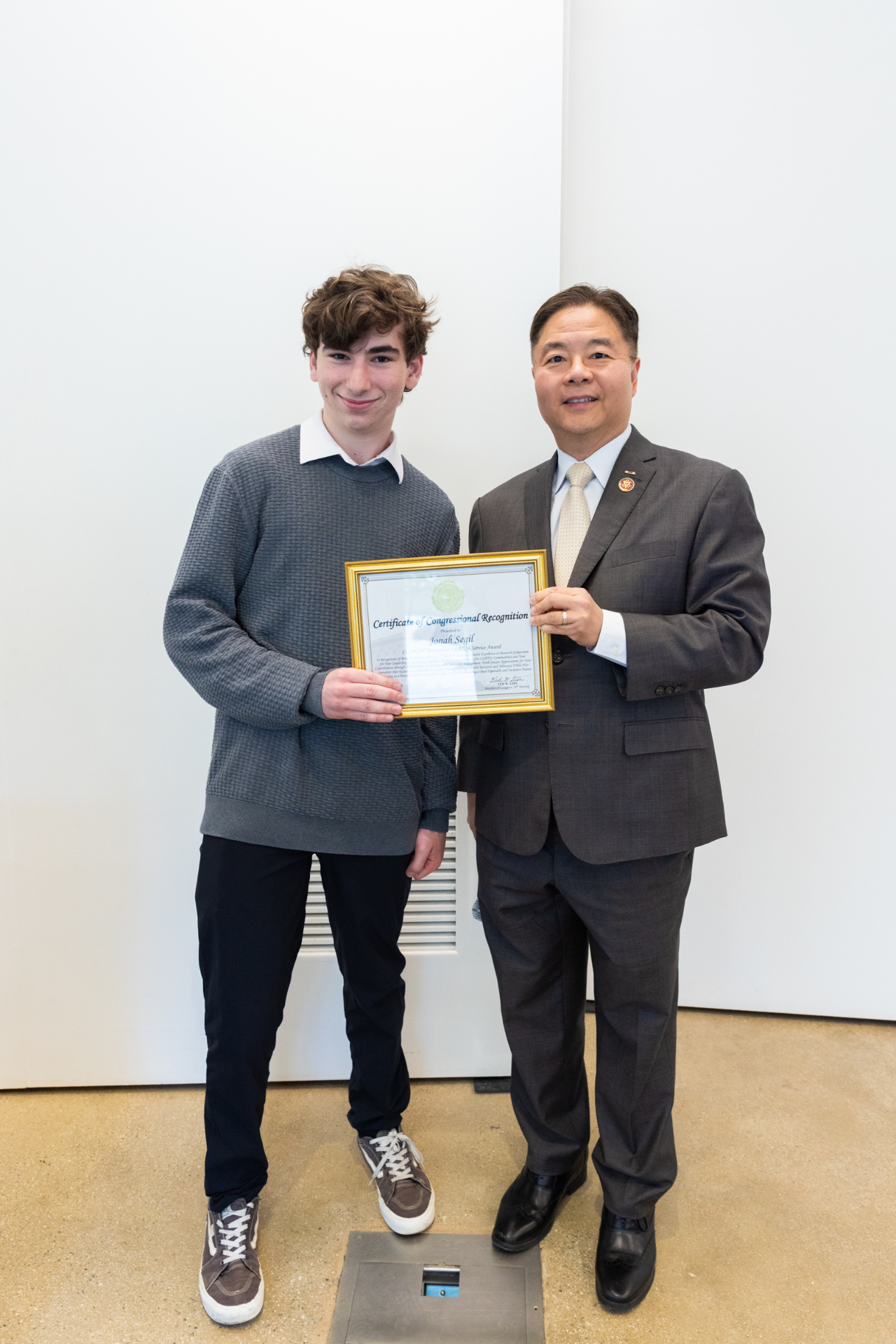 Jonah receiving the Certificate of Congressional Recognition from Congressman Ted Lieu
