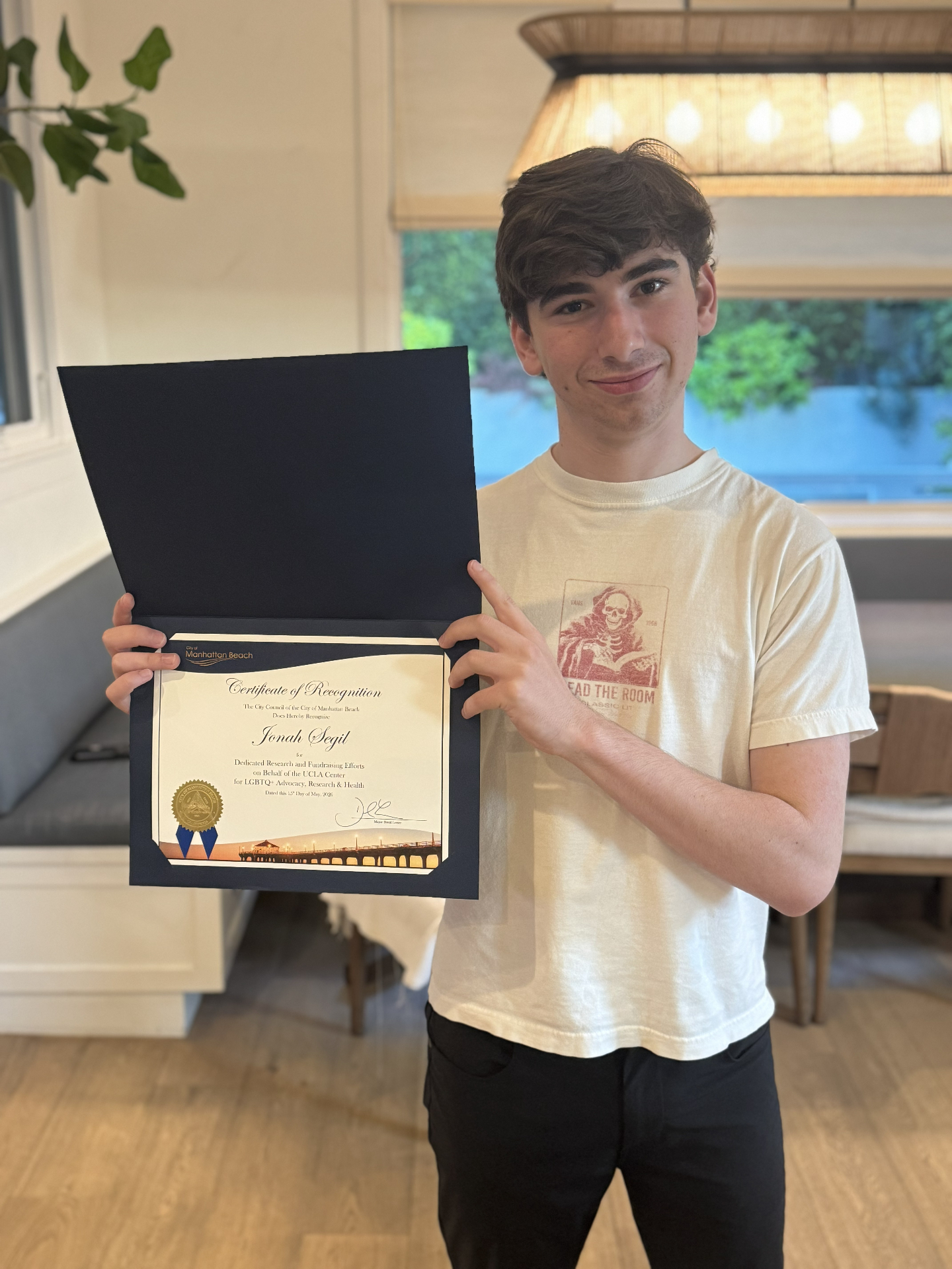 Jonah holding the 2026 Certificate of Recognition from the Mayor and City Council of Manhattan Beach