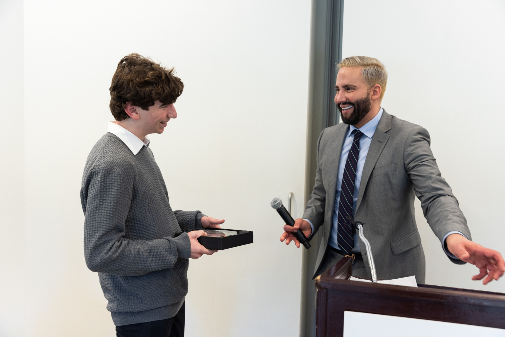 Jonah accepting the UCLA C-LARAH Meritorious LGBTQ+ Service Award at the annual symposium
